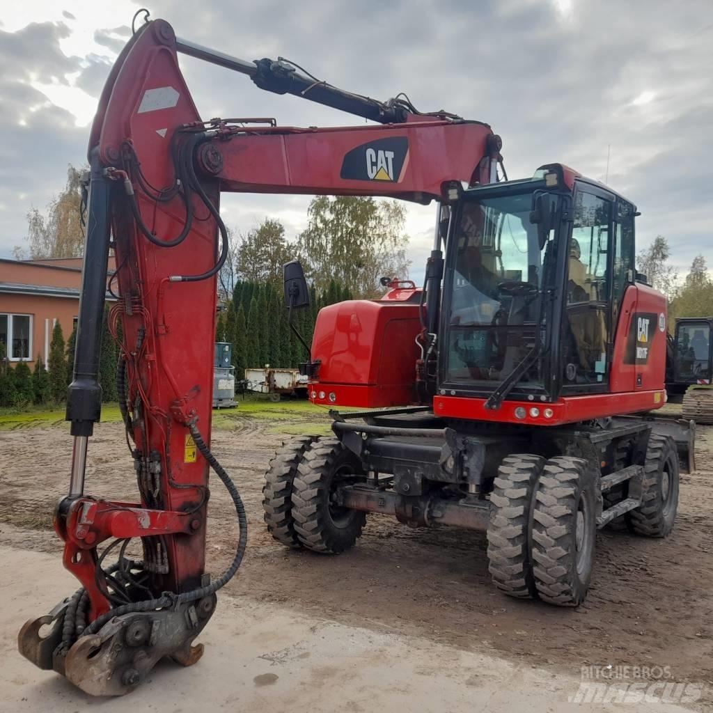 CAT M317 Ekskavatori uz riteņiem