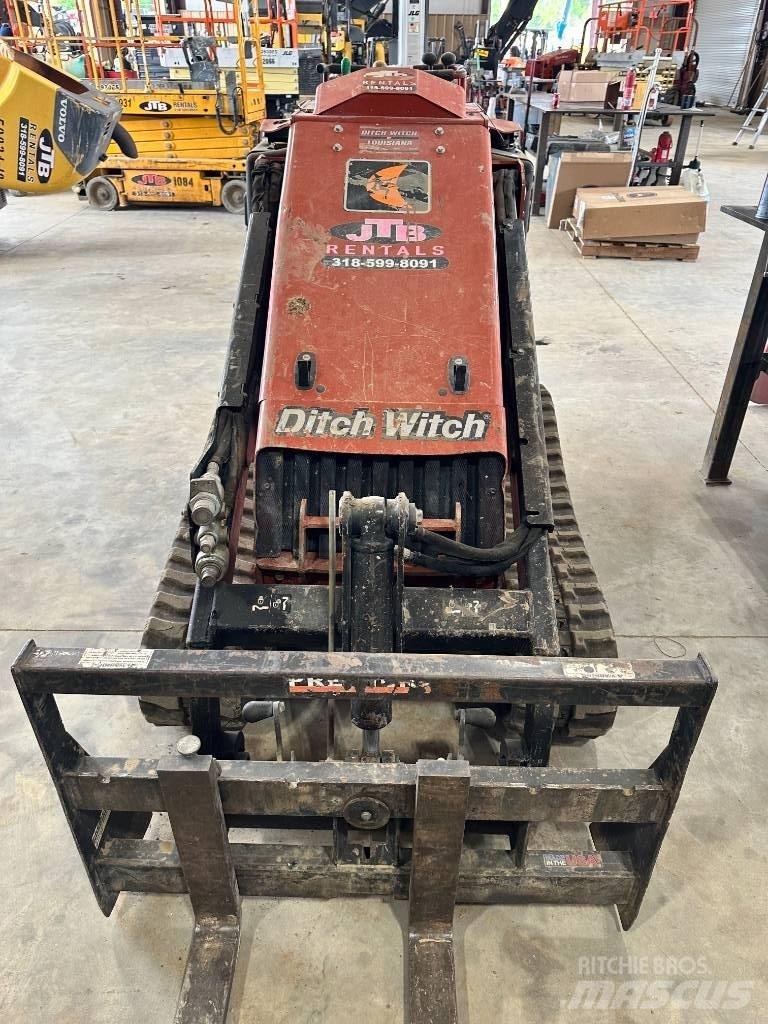 Ditch Witch SK 1050 Lietoti riteņu kompaktiekrāvēji