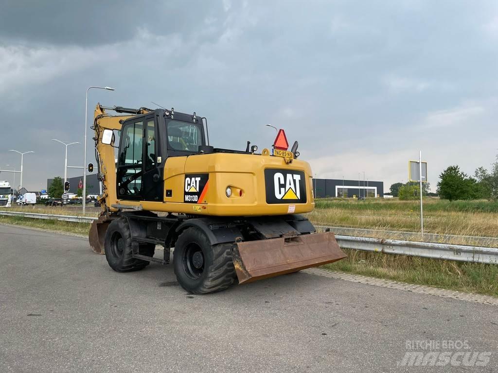 CAT M313D - CE Ekskavatori uz riteņiem