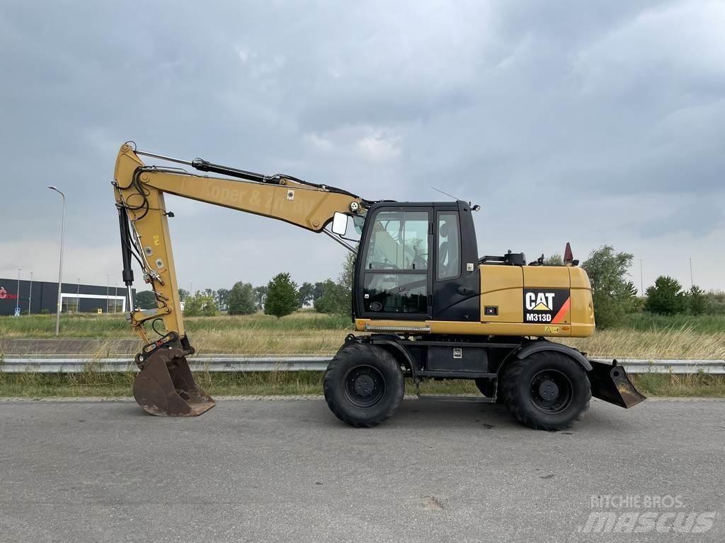 CAT M313D - CE Ekskavatori uz riteņiem