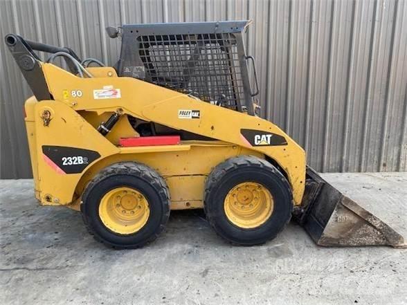 CAT 232B2 Lietoti riteņu kompaktiekrāvēji