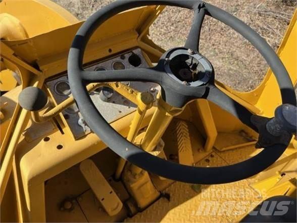 CAT 950 Iekrāvēji uz riteņiem