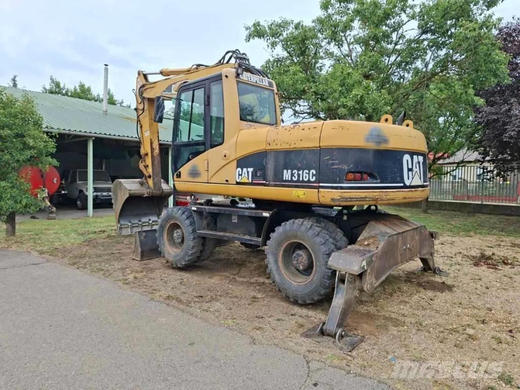 CAT M 316 C Ekskavatori uz riteņiem