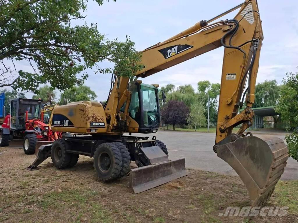 CAT M 316 C Ekskavatori uz riteņiem