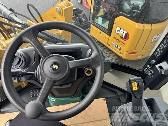CAT 906 Iekrāvēji uz riteņiem