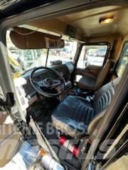 Mack CV 713 Pašizgāzējs