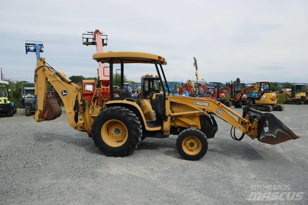 DEERE 110 Ekskavatori-iekrāvēji