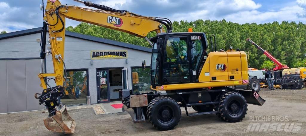 CAT 314 Ekskavatori uz riteņiem