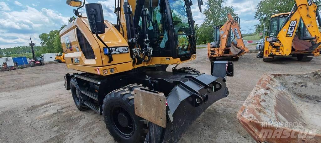 CAT 314 Ekskavatori uz riteņiem