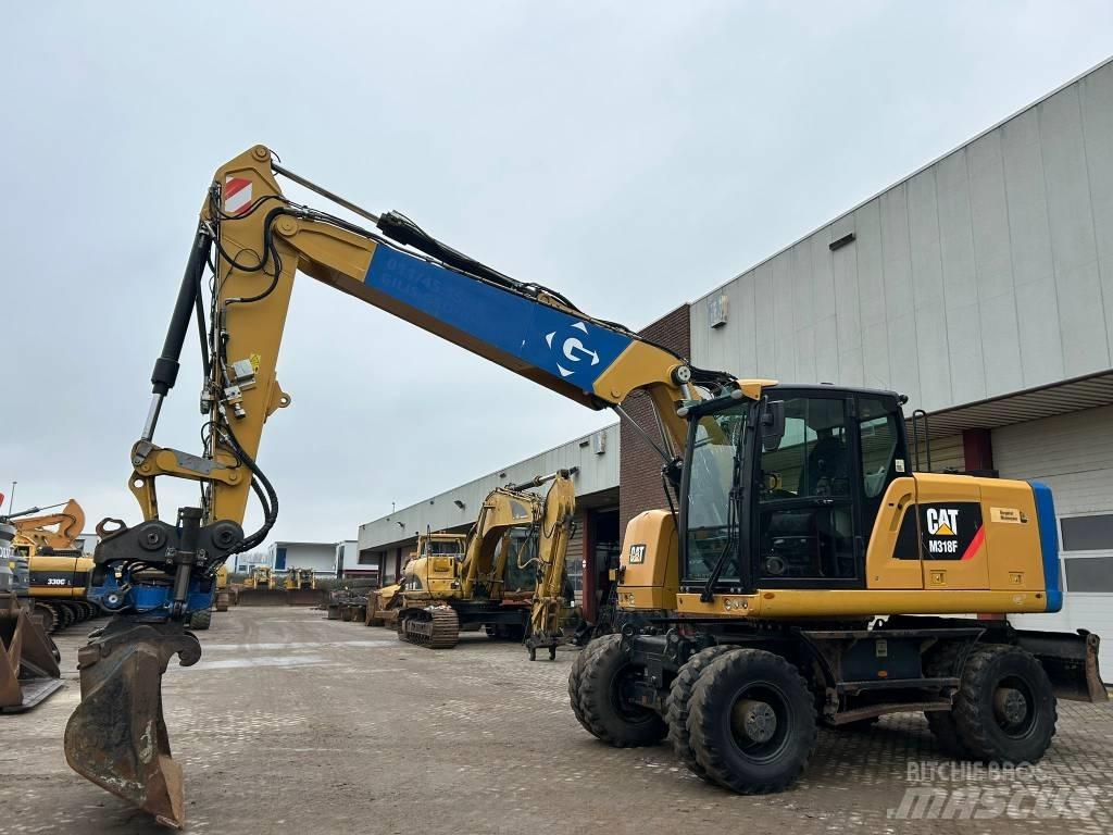 CAT M 318 F Ekskavatori uz riteņiem
