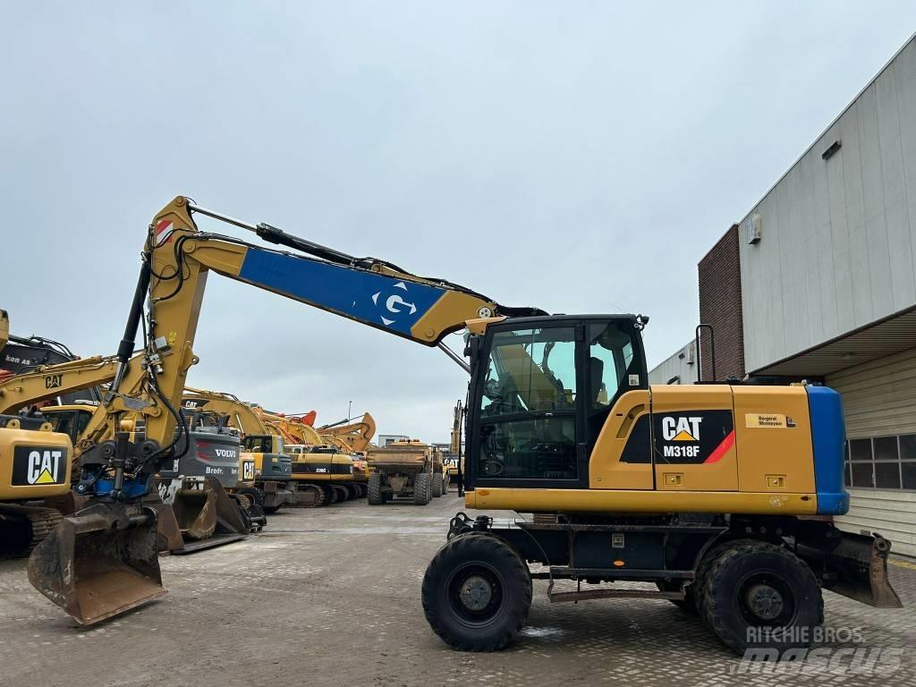 CAT M 318 F Ekskavatori uz riteņiem