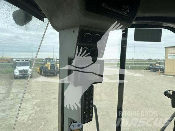 CAT 966M Iekrāvēji uz riteņiem