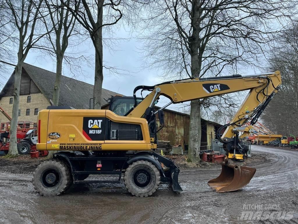 CAT M 318 F Ekskavatori uz riteņiem