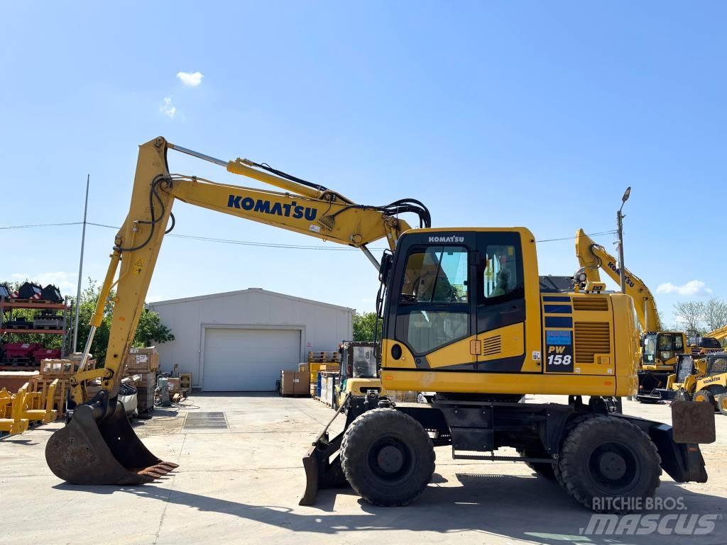 Komatsu PW 158-11 Ekskavatori uz riteņiem