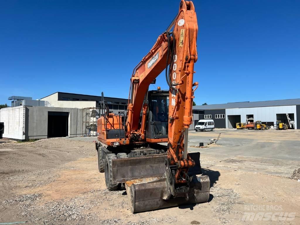 Doosan DX 140 W Ekskavatori uz riteņiem