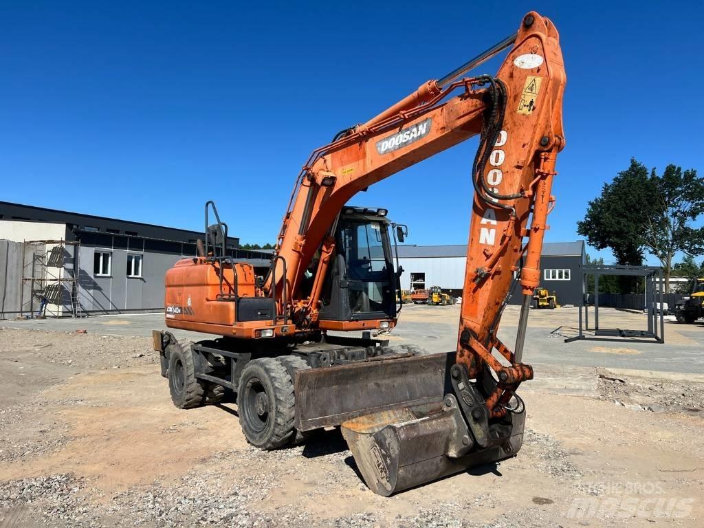 Doosan DX 140 W Ekskavatori uz riteņiem