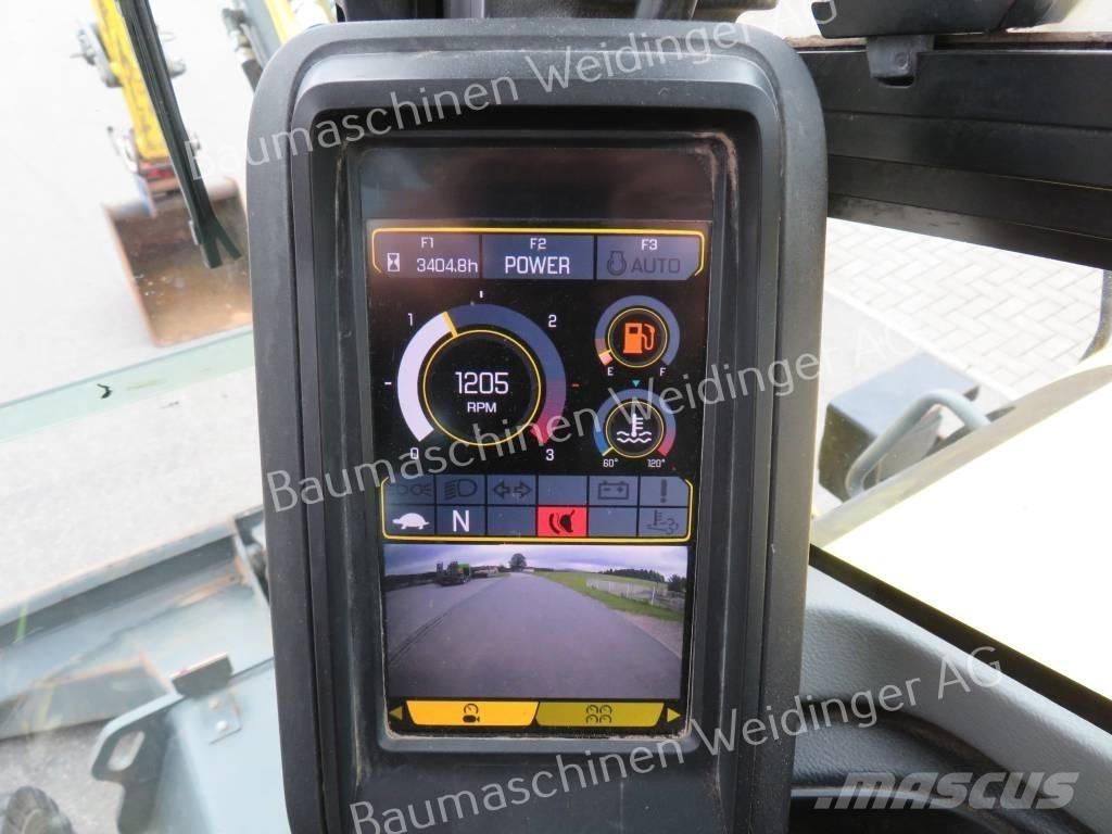 Neuson EW 65 Ekskavatori uz riteņiem