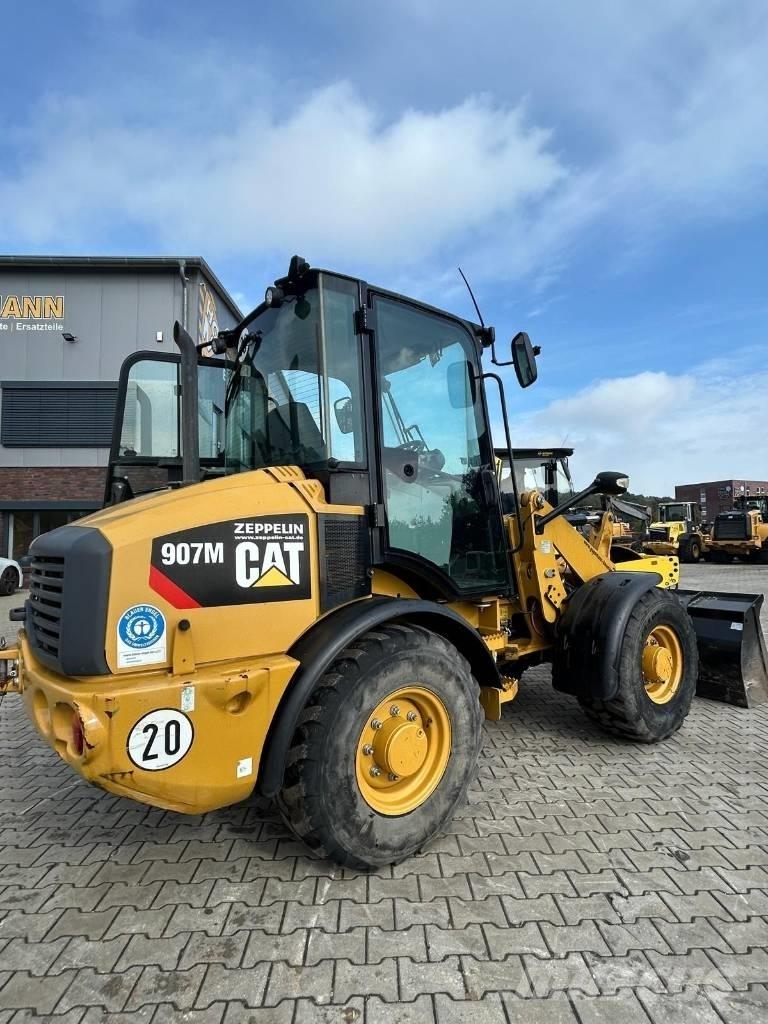 CAT 907 M Iekrāvēji uz riteņiem