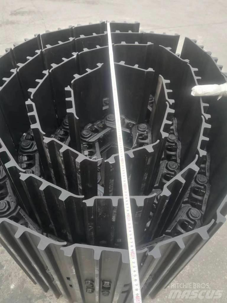 Komatsu PC210-8 Sliedes, ķēdes un šasija