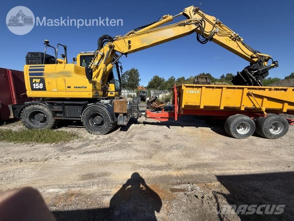 Komatsu PW 158 Ekskavatori uz riteņiem