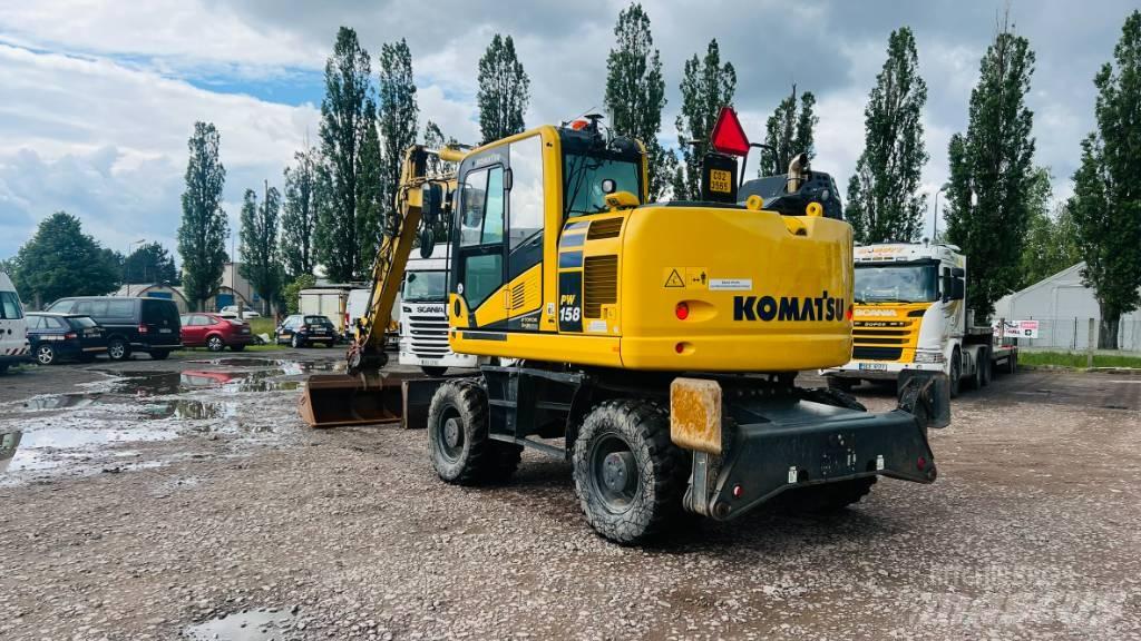 Komatsu PW 158 Ekskavatori uz riteņiem