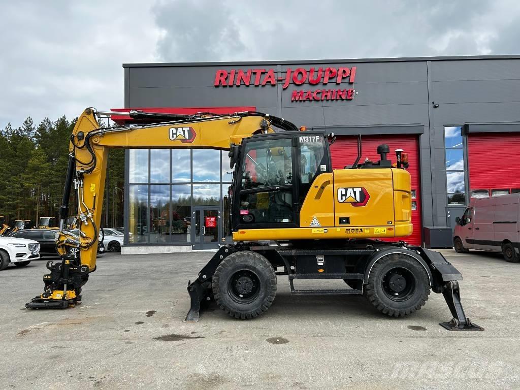 CAT M317F / Myyty, Sold Ekskavatori uz riteņiem