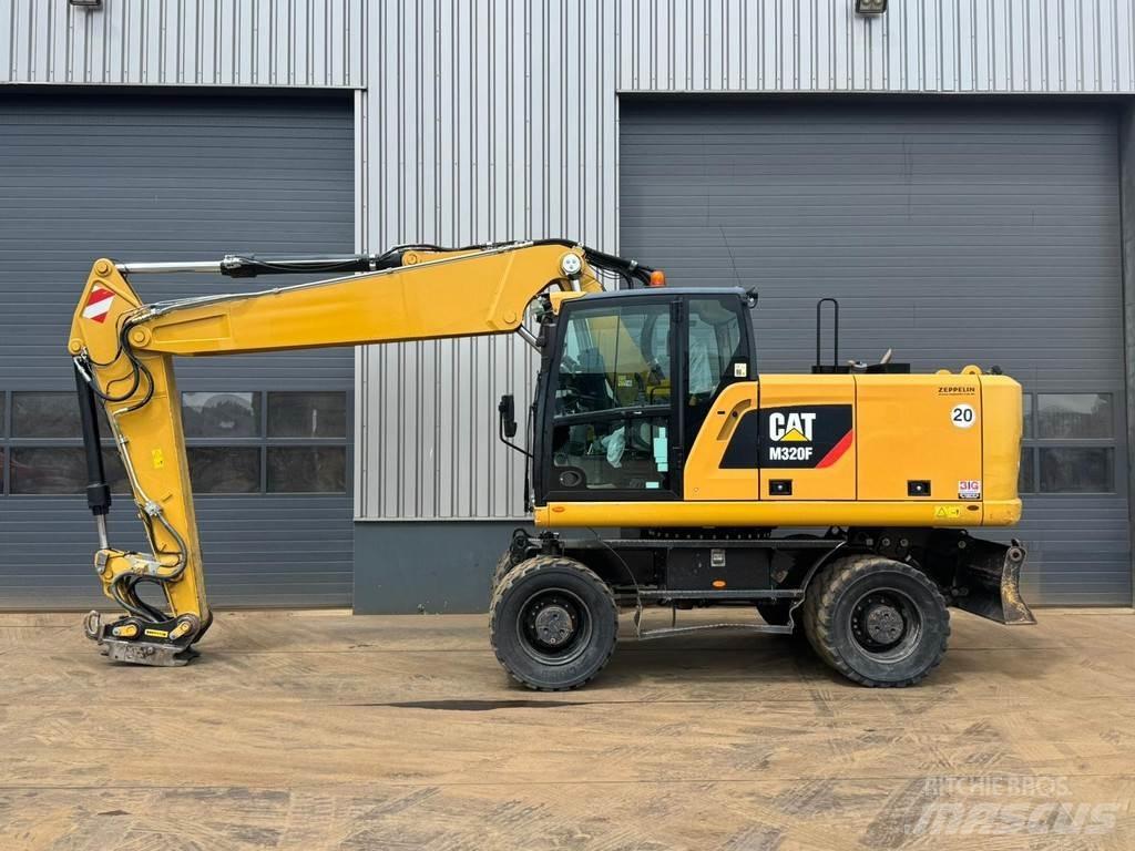 CAT M320F Ekskavatori uz riteņiem