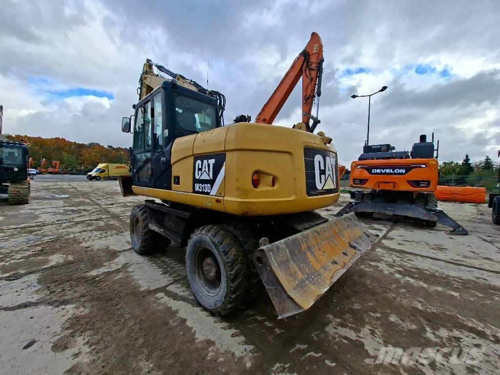 CAT M313D Ekskavatori uz riteņiem