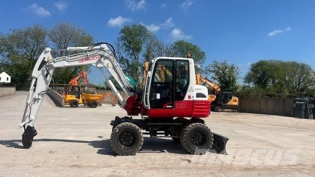 Takeuchi TB295W Ekskavatori uz riteņiem
