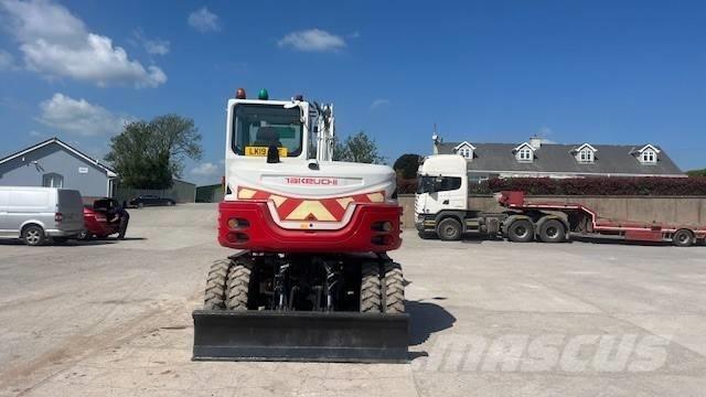 Takeuchi TB295W Ekskavatori uz riteņiem