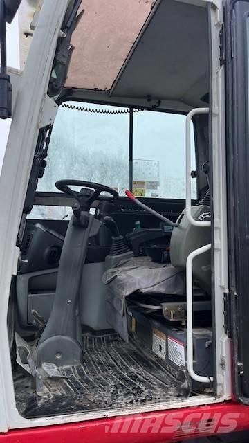 Takeuchi TB295W Ekskavatori uz riteņiem