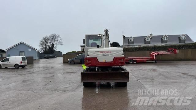 Takeuchi TB295W Ekskavatori uz riteņiem