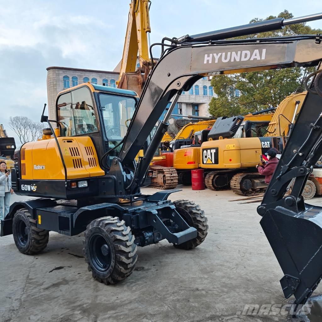 Hyundai 60 W VS Ekskavatori uz riteņiem
