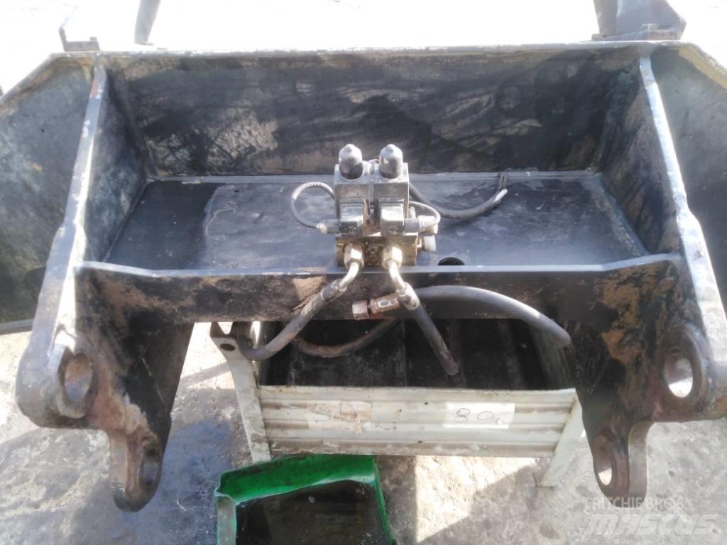 CAT M 318 Šasija un piekare