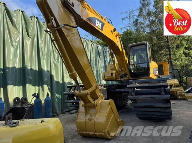 CAT 320 C Amfībijas tipa ekskavatori