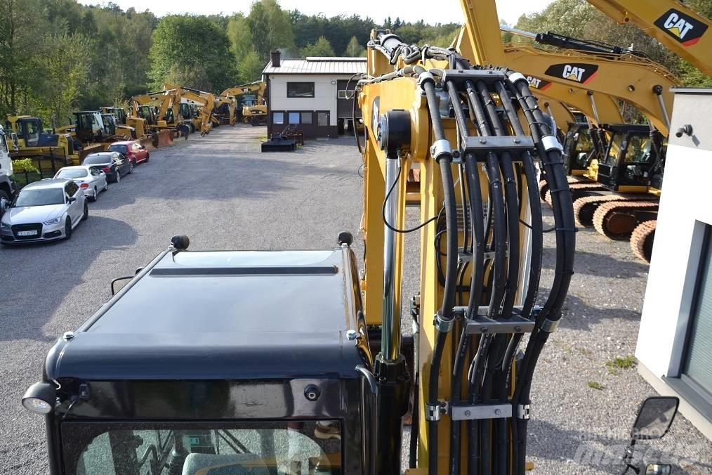 CAT M 315 D Ekskavatori uz riteņiem