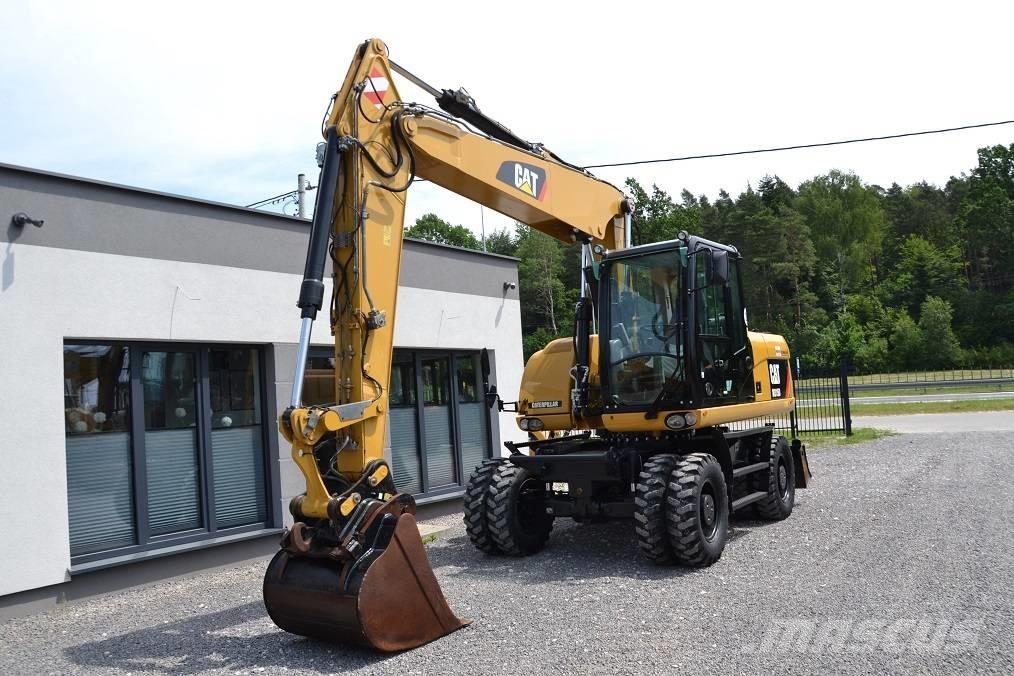 CAT M 315 D Ekskavatori uz riteņiem