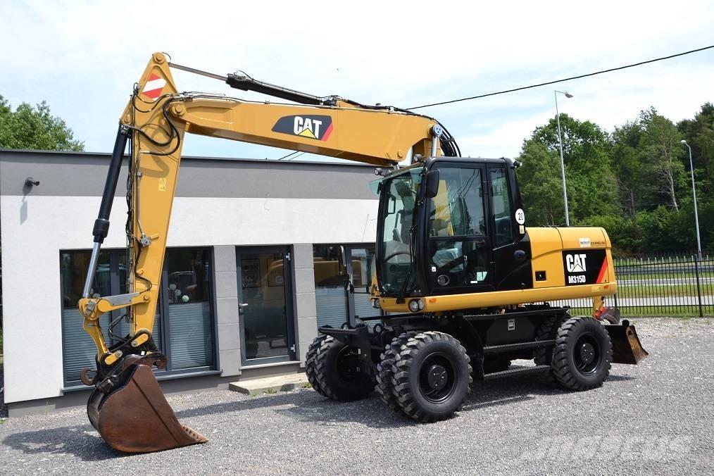 CAT M 315 D Ekskavatori uz riteņiem