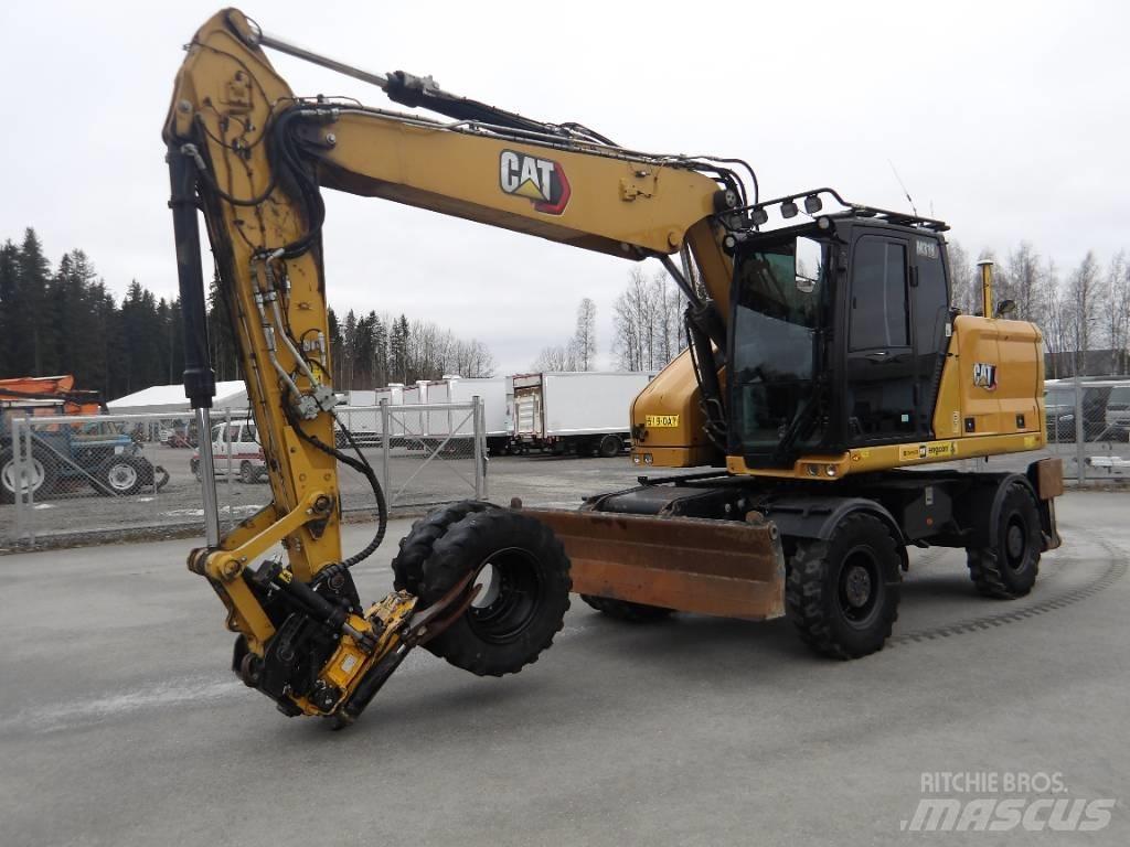 CAT M 318 Ekskavatori uz riteņiem