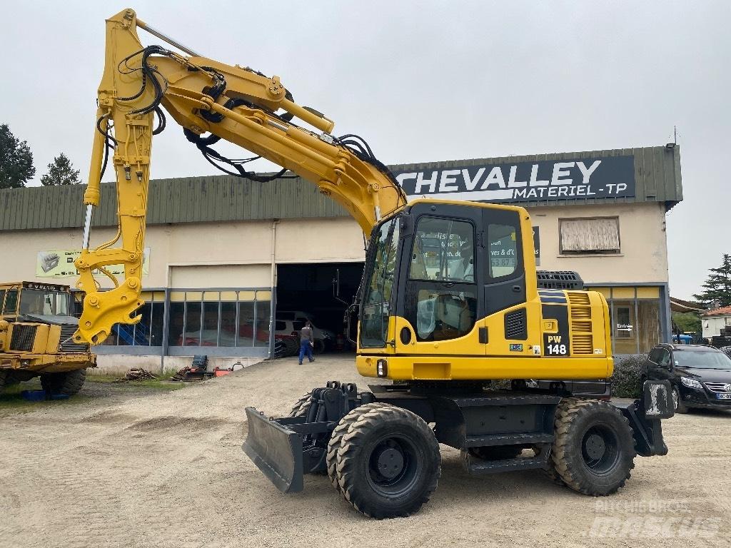 Komatsu PW 148-8 Ekskavatori uz riteņiem