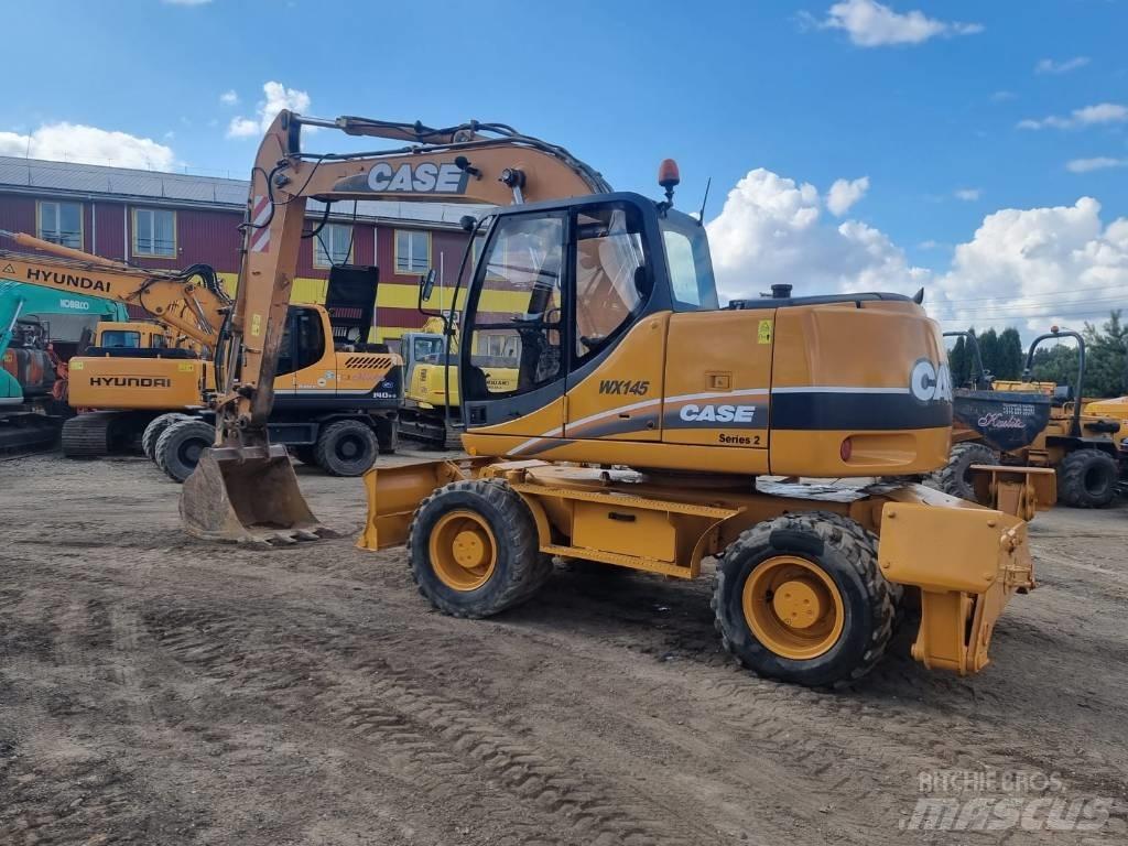 CASE WX 145 Ekskavatori uz riteņiem