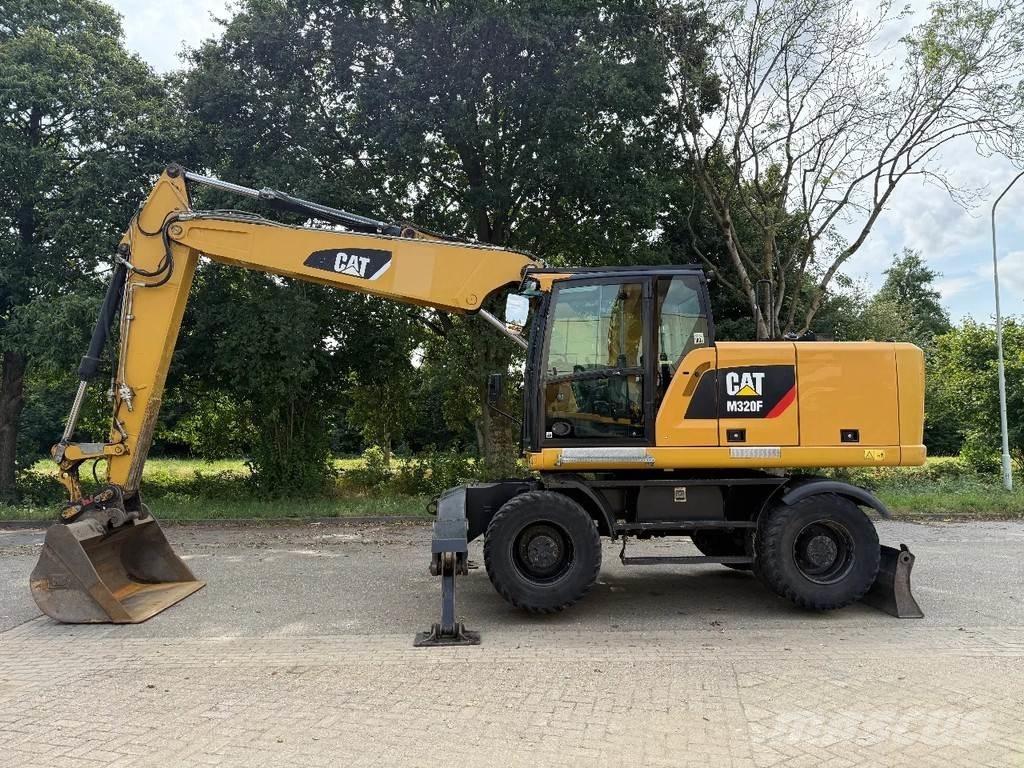 CAT M320F Ekskavatori uz riteņiem