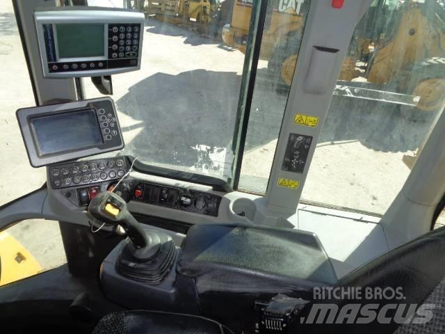 CAT 938M Iekrāvēji uz riteņiem
