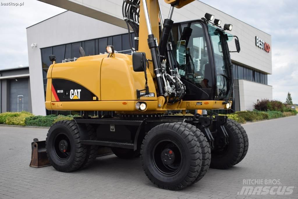 CAT M 313 D Ekskavatori uz riteņiem