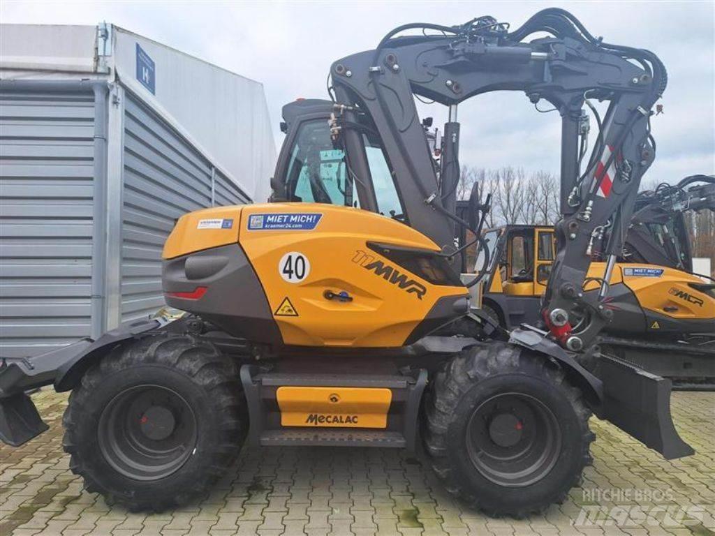 Mecalac 11 MWR Ekskavatori uz riteņiem