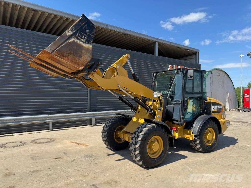 CAT 906M Iekrāvēji uz riteņiem