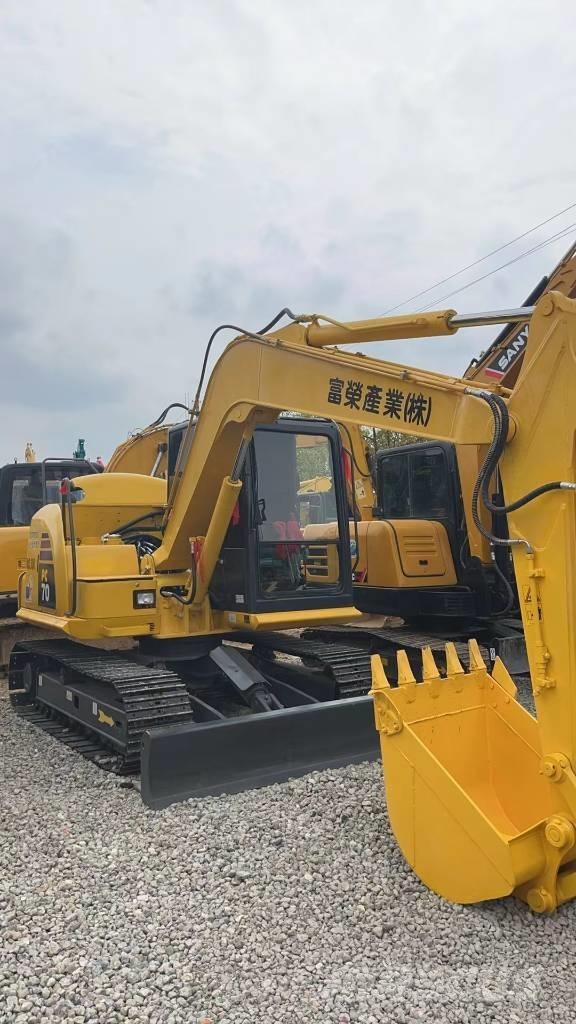 Komatsu PC 70 Vidēja lieluma ekskavatori 7 t - 12 t