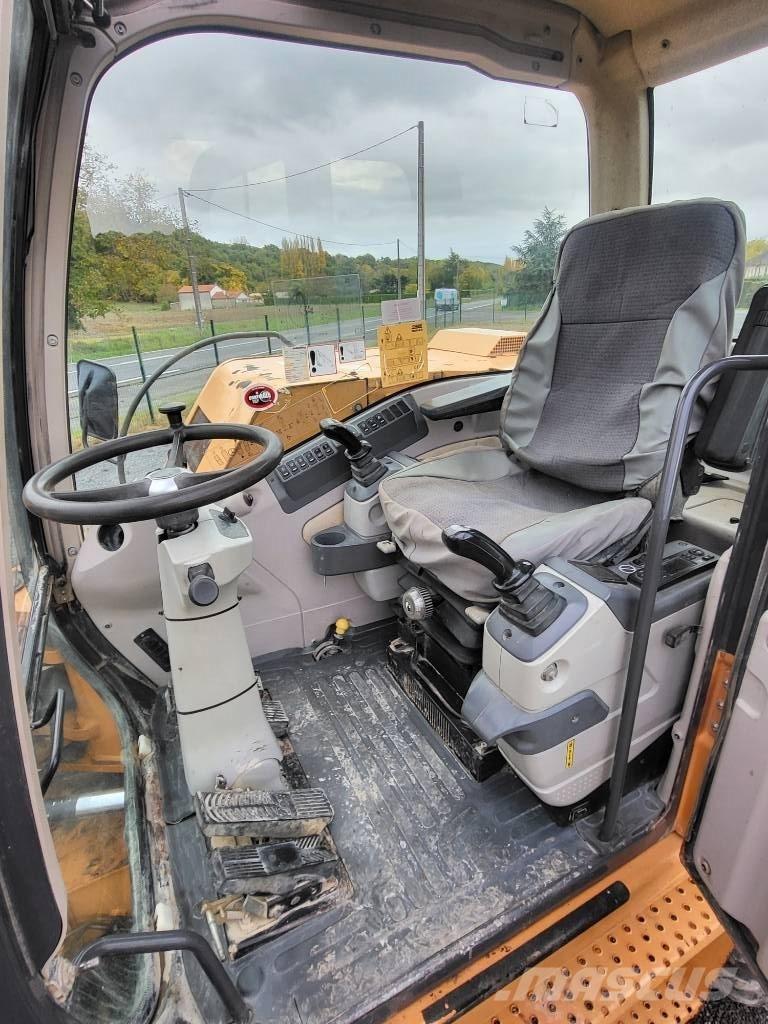 CASE WX 125 Ekskavatori uz riteņiem