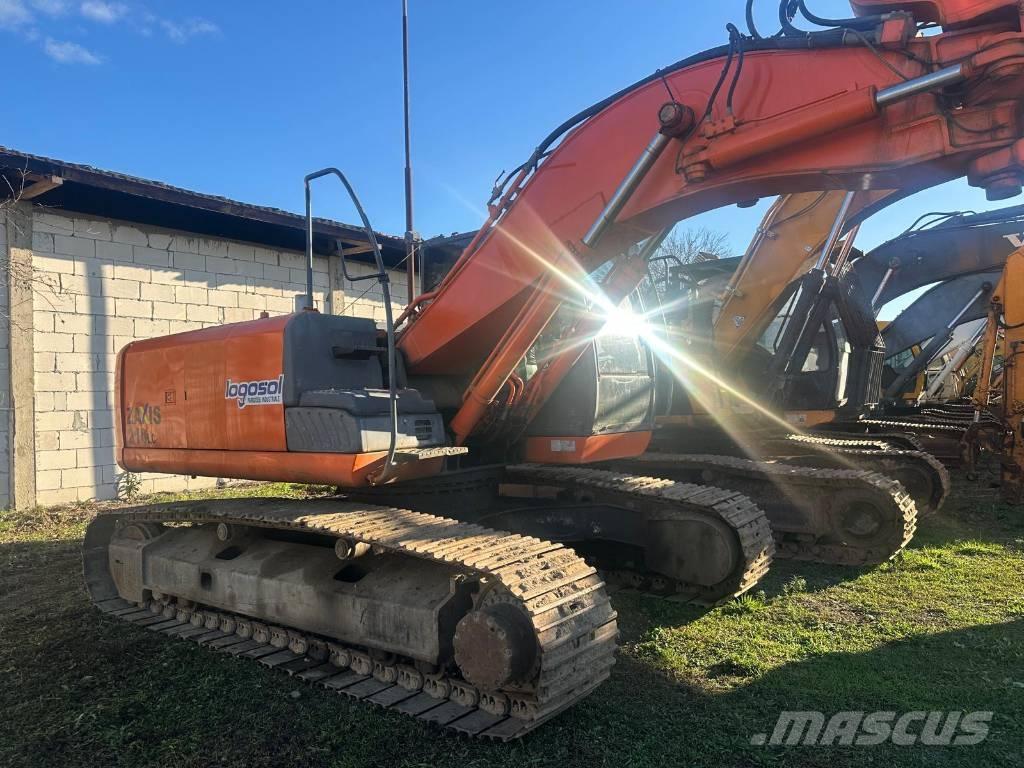 Hitachi Zaxis 210LC3 Sliedes, ķēdes un šasija