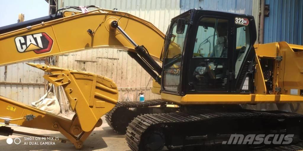 CAT 2020 CAT 323Gc Ekskavatori uz riteņiem